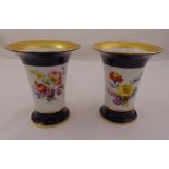 A pair of Meissen trumpet vases decorated with flowers and gilded rims, marks to the base, 16cm (h)