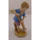 Meissen figurine of a boy with a spade digging on naturalistic base, marks to the base, 13cm (h)