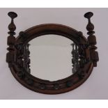 A Victorian turned mahogany wooden hall mirror with turned coat hooks, 31 x 36cm