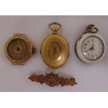 A 9ct and enamel ladies pocket watch, a 9ct gold wristwatch A/F, a locket and a brooch (4)