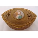 A continental gilded metal oval trinket box, the hinged cover set with a portrait of Napoleon,