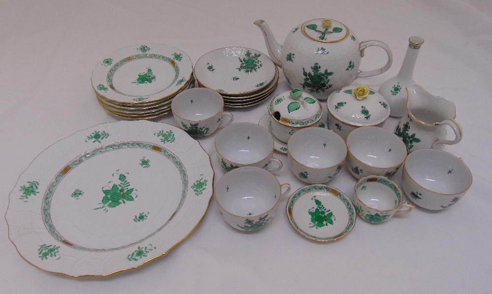 A Herend Chinese Bouquet tea service to include a teapot, milk jug and sugar bowl, plates, cups