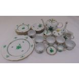 A Herend Chinese Bouquet tea service to include a teapot, milk jug and sugar bowl, plates, cups