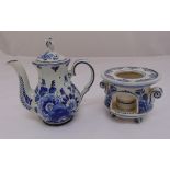 Delft blue and white teapot and a ceramic pastille burner