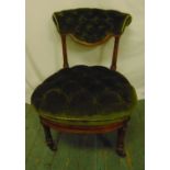 A Victorian mahogany button back upholstered nursing chair on turned cylindrical legs, 67 x 48 x
