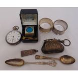 A quantity of silver and silver plate to include napkin rings, a pocket watch, a pendant, two