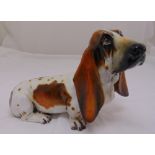 An Italian signed life size ceramic model of a Bassett Hound circa 1960s, 28cm (h) 43cm (w)