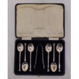 A cased set of silver teaspoons and a pair of sugar tongs, approx total weight 88g