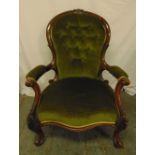 A Victorian mahogany button back upholstered armchair on carved cabriole legs, 94 x 71 x 74cm
