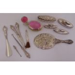 A quantity of hallmarked silver dressing table pieces to include nail buffers, a hand mirror and a