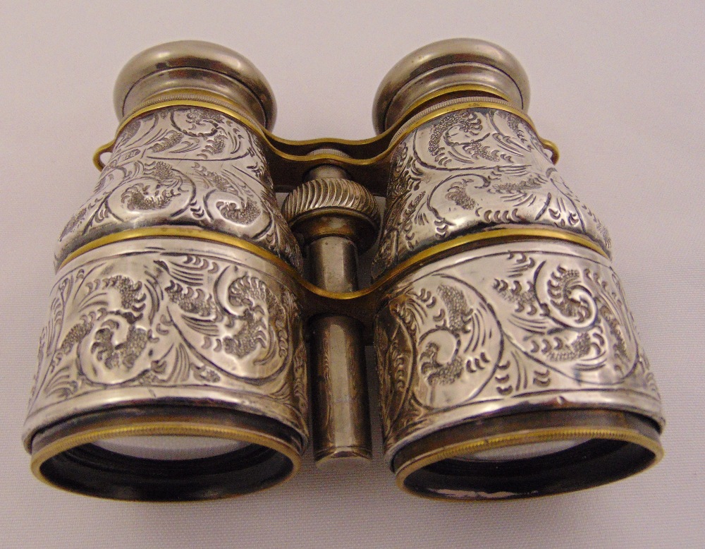 A pair of Victorian silver opera glasses, chased with flowers, scrolls and leaves, Birmingham 1894