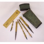 An early 19th century Shagreen and silver cased drawing instrument set to include a ruler signed