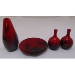 Three Doulton flamb‚ vases and a matching bowl