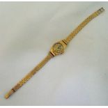 9ct gold Cyma ladies wristwatch on a 9ct gold bracelet, approx total weight 17.1g