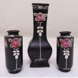 A Shelley black ground vase decorated with roses and a pair of matching vases, 22cm and 13cm (h)