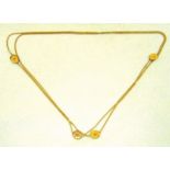 Gold fancy link necklace inset with four pendants, tested 9ct, approx total weight 27.7g