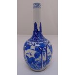 A Chinese blue and white vase decorated with flowers, scrolls and animals, six character mark to the