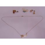 A quantity of gold jewellery to include 21ct and enamel earrings, two 9ct gold pairs of earrings and