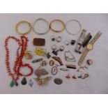 A quantity of silver and costume jewellery to include necklaces, bangles, rings and watches