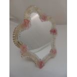 A Murano glass dressing table mirror with applied pink flowers and hinged back strut, 36.5 x 30.5cm