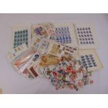 A quantity of GB and foreign stamps to include sheets, first day covers and loose stamps