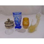 A quantity of glass to include coloured Bohemian vases, Murano fish, a Baccarat Swan, Val St Lambert