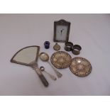 A quantity of silver and white metal to include a silver mounted desk clock, a perfume bottle, a