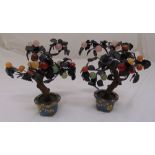 A pair of cloisonné pots with miniature trees made of semi precious stones