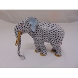 A Herend hand painted figurine of an elephant, marks to the base, 15.5 x 17.5cm