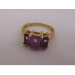 9ct yellow gold and amethyst three stone ring, approx total weight 4.8g