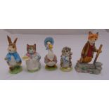 Five Beatrix Potter figurines, one A/F
