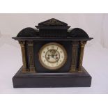 A French black slate mantle clock with white enamel dial and Arabic numerals, two train movement