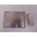 The Howitt engine turned silver lighter and an engine turned silver cigarette case, both fully