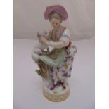 Meissen 19th century figurine of a girl with a lamb, slight loss to foliage, marks to the base, 18.