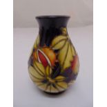 Moorcroft vase decorated with flowers by Kerry Godwin, marks to the base, 14cm (h)