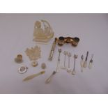 A quantity of silver and white metal to include mother of pearl items, olive forks, an agate seal,