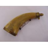 A horn powder flask with brass mounts, 23cm long