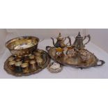 A quantity of silver plate to include a punch bowl, trays, teaset and cups