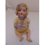 Armand Marseille late 19th century bisque headed doll with original handmade clothes and bonnet