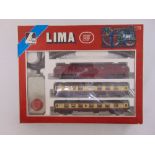 Lima OO gauge train set in original packaging to include a locomotive, two coaches, track and