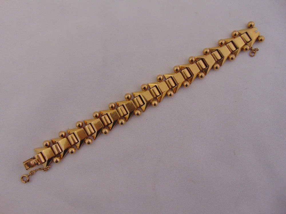 Portuguese 19.2ct yellow gold fancy link bracelet with safety chain, length 19cm, approx weight 50.