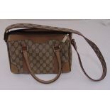 Gucci monogrammed canvas and leather ladies handbag with shoulder strap, A/F