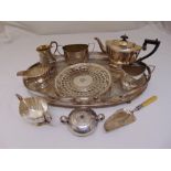 A quantity of silver plate to include a gallery tray, a teaset and a crumb scoop