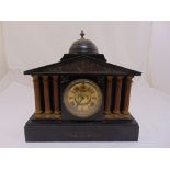 An Ansonia Clock Co. black slate mantle clock, architectural form, gilded dial, Roman numerals,