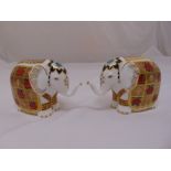 A pair of Royal Crown Derby elephant figurines with gold seals and marks to the bases, 10.5cm (h)