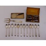 A quantity of silver to include twelve Old English pattern teaspoons, a serving fork with mother