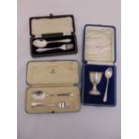 Asprey cased silver christening spoon and fork London 1935, a cased christening set Birmingham