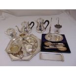 A quantity of silver plate to include a Christofle tea and coffee set