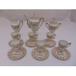 Atelier LeTallac raised gold grape wreath porcelain coffee set to include coffee pot, cups, saucers,