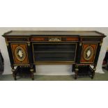 A 19th century credenza of rectangular form, the ebonised body inset with Wedgewood plaques,